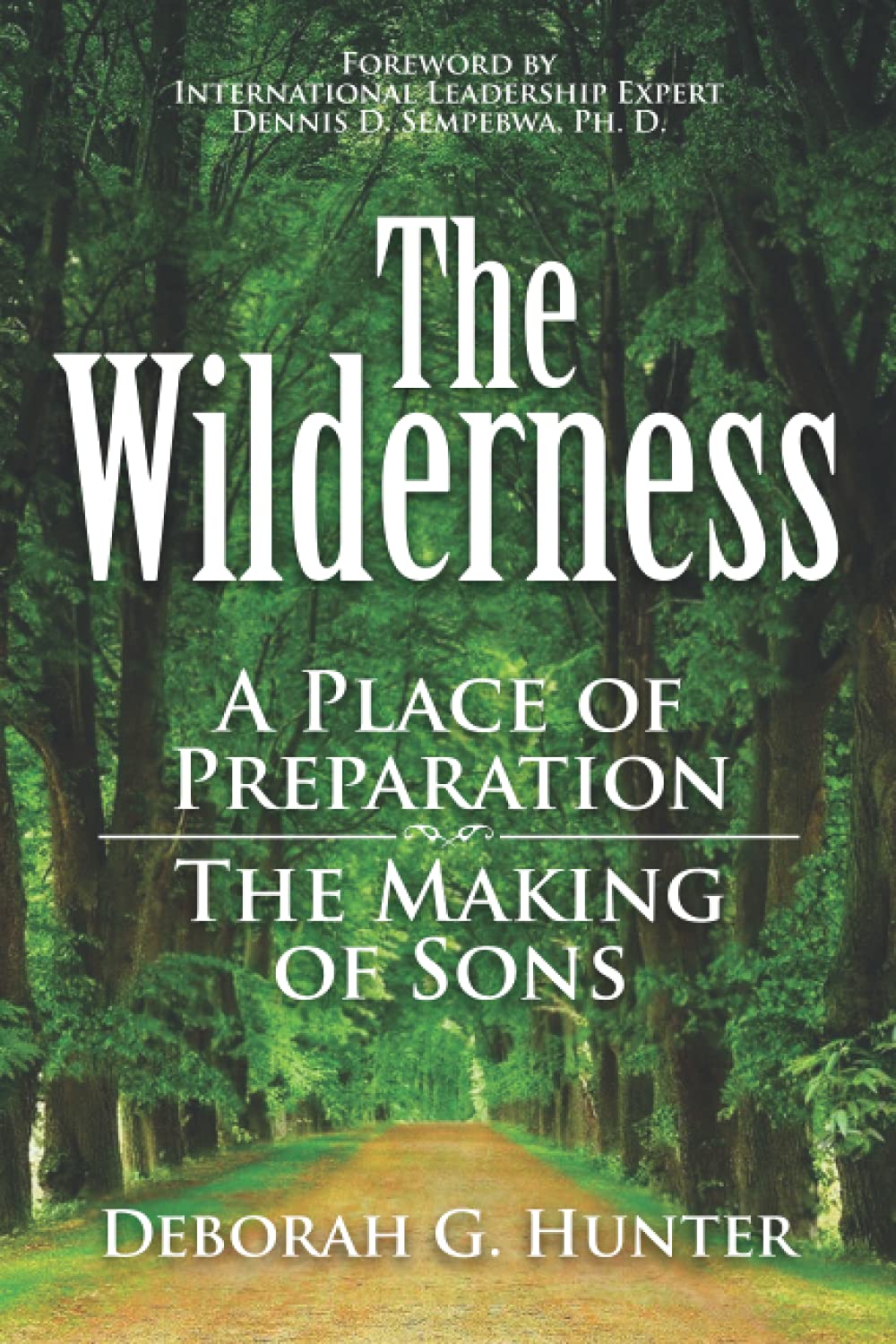Book cover for The Wilderness: A Place of Preparation, The Making of Sons by Deborah G. Hunter, featuring a tree-lined path leading into a green forest with sunlight filtering through the leaves.
