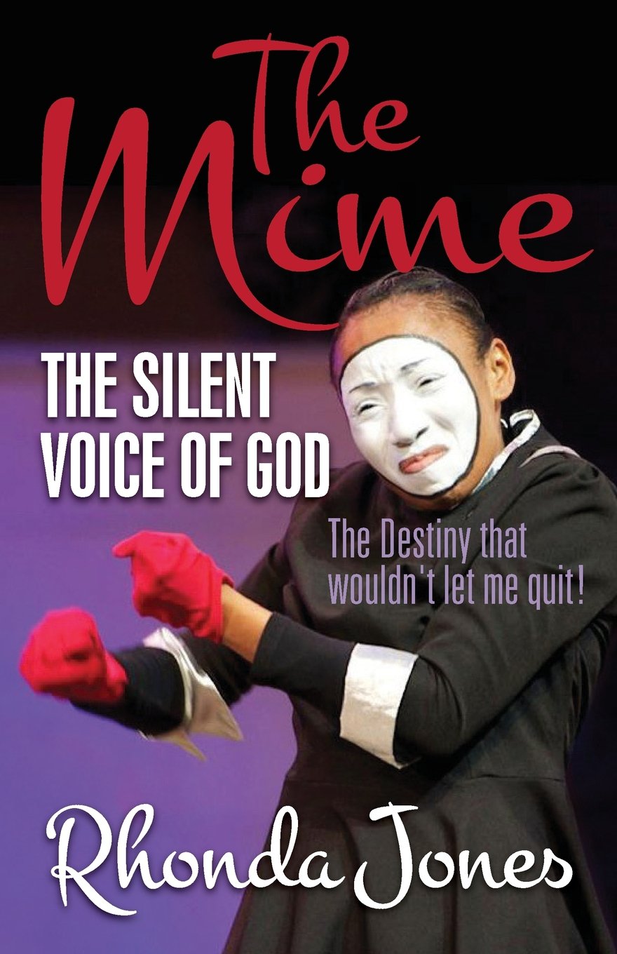A person in mime makeup and costume performs with expressive hand gestures. The book cover reads: The Mime: The Silent Voice of God. The Destiny that wouldnt let me quit! Rhonda Jones.